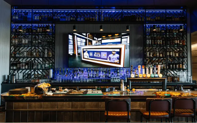 Large 12x7ft LG DVLED signage installation for high-impact golf entertainment venue solutions.