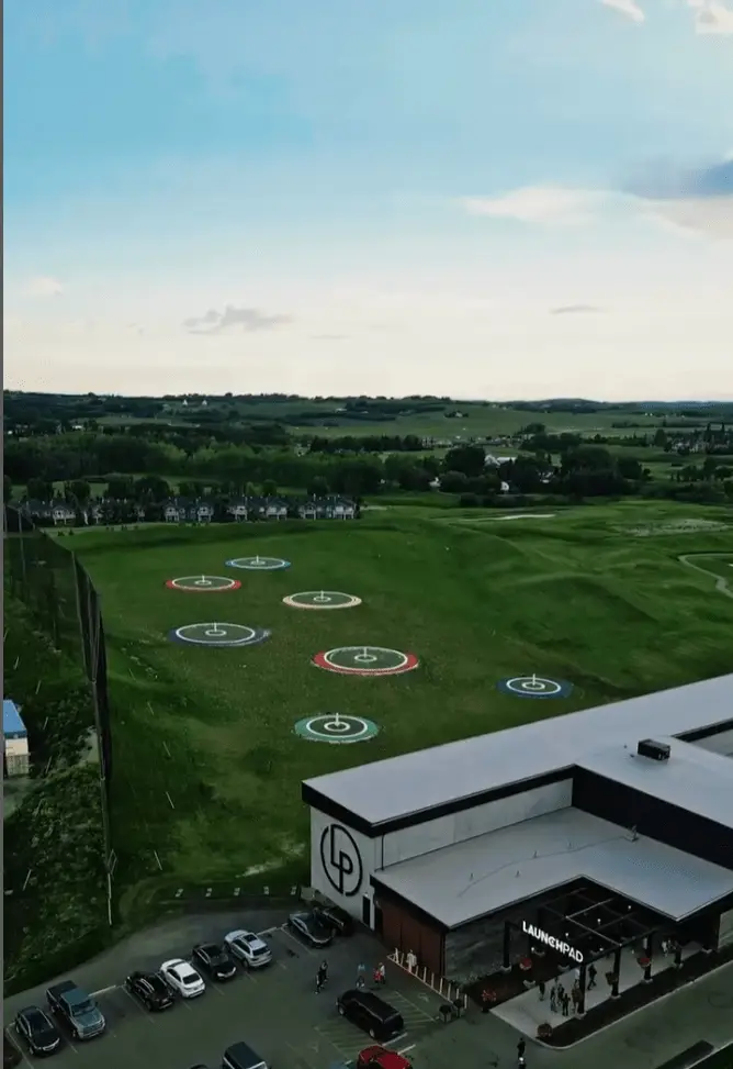 Custom-manufactured weatherproof TV enclosures for outdoor hitting bays at LaunchPad Golf